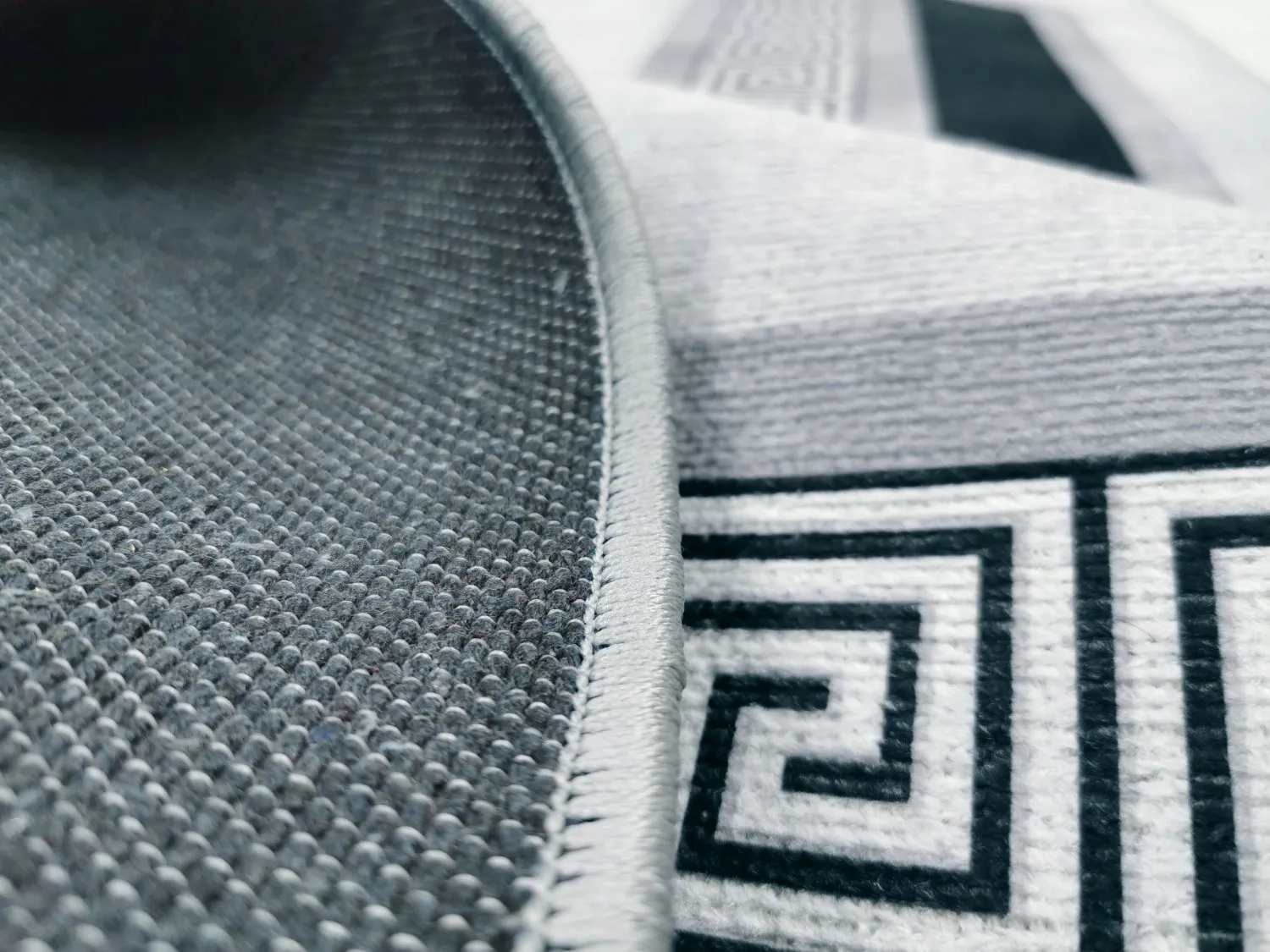 Wilton-Teppich - Olympia (schwarz/weiß)